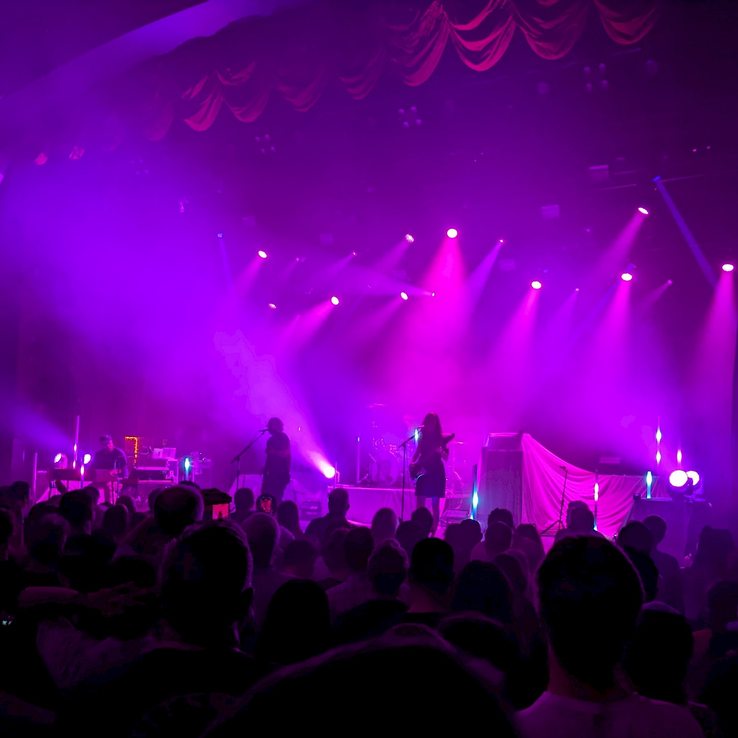 Silversun Pickups on stage with purpley-blue lighting