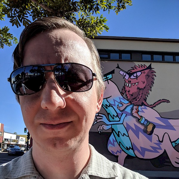 Selfie in front of the mural